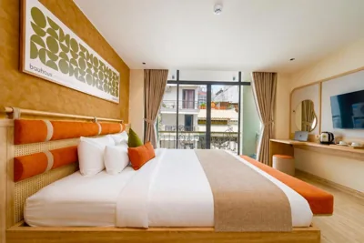 Triple Suite con ventana - Minibar diario gratuito — KOVA Hotel - Bui Vien Central